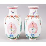 A GOOD PAIR OF 19TH / 20TH CENTURY CHINESE FAMILLE ROSE PORCELAIN BARAGON TOUMET WEDDING VASES, each