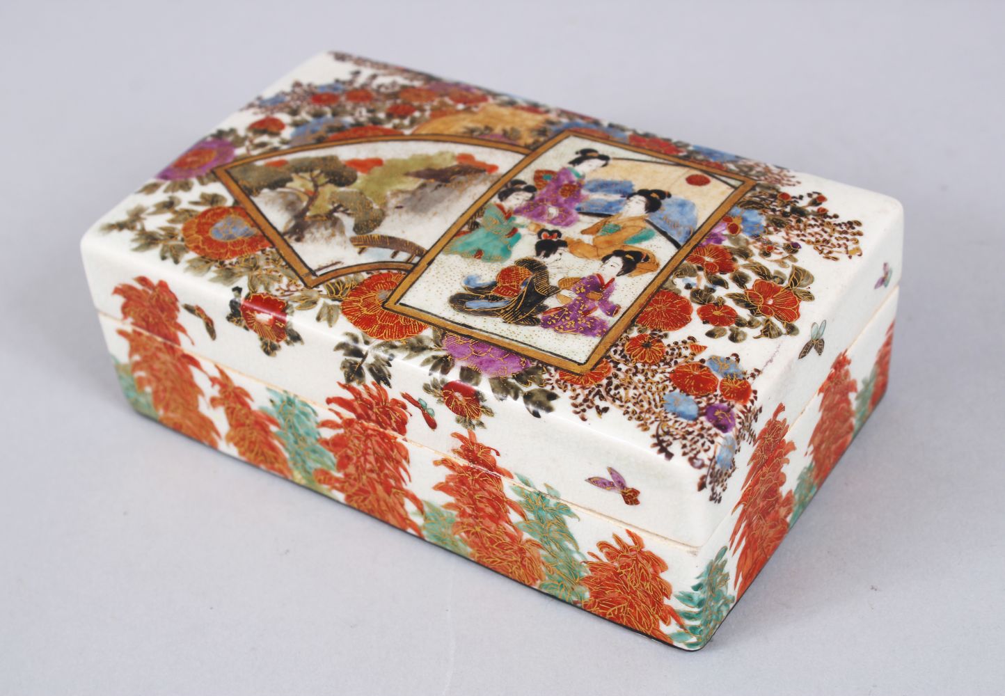 A GOOD JAPANESE MEIJI PERIOD SATSUMA BOX & COVER, the box decorated with two panels of geisha girls,