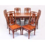 A GOOD 20TH CENTURY CHINESE HUANGHUALI WOOD DINING TABLE & SIX CHAIRS, the table carved with