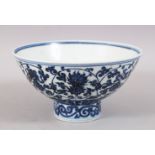 A GOOD CHINESE MING STYLE PORCELAIN STEM BOWL, decorated with formal scrolling flora, the interior