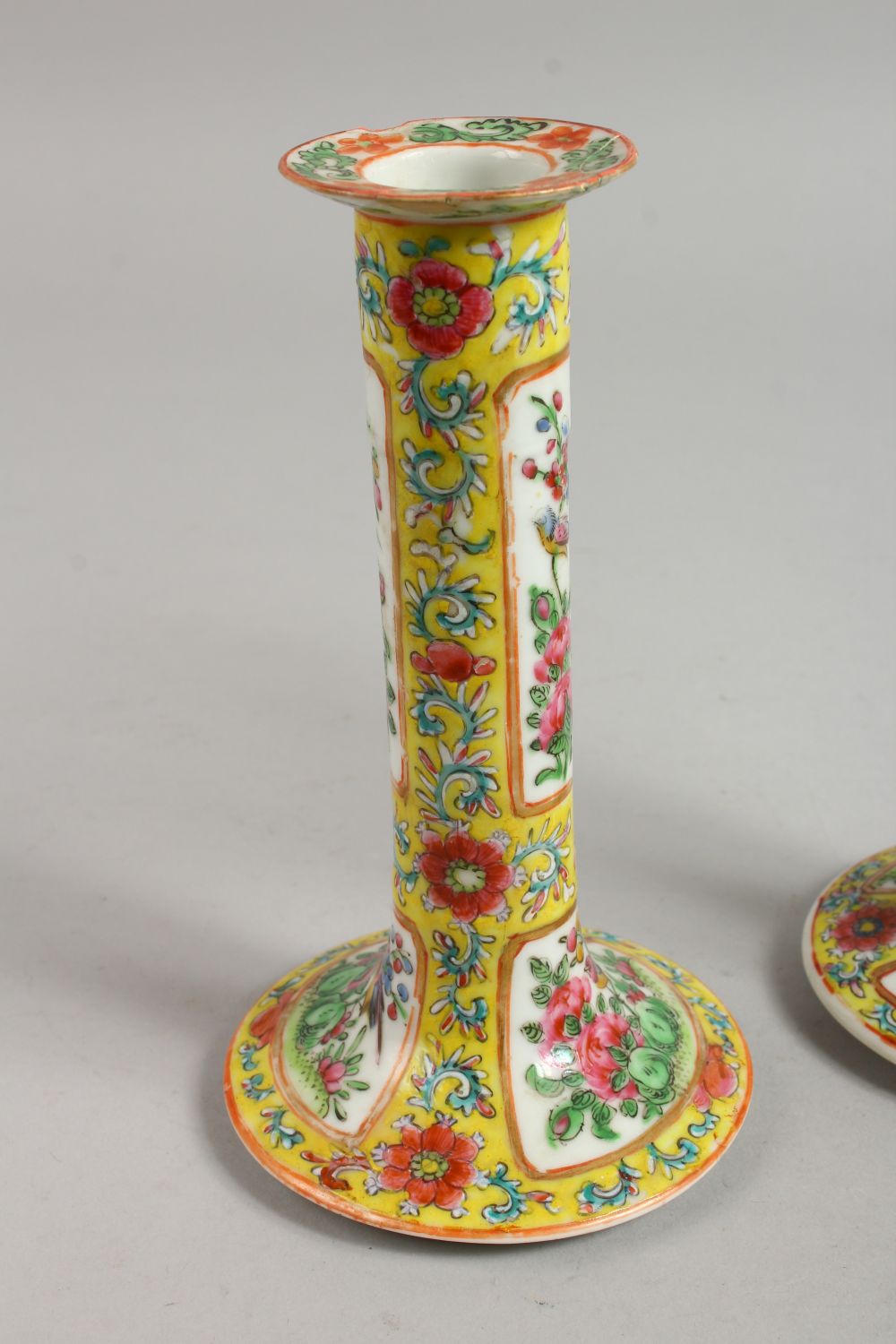 A GOOD PAIR OF CANTON FAMILLE JAUNE CANDLESTICKS with panels of flowers and birds. 7ins high. - Image 3 of 12