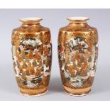 A PAIR OF JAPANESE MEIJI PERIOD SATSUMA VASES, decorated with scenes of immortals and geisha girls