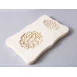A GOOD 19TH CENTURY CHINESE CANTON CARVED IVORY CARD CASE, the central section with shaped panels in