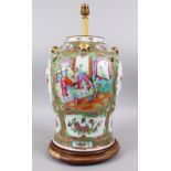 A 19TH CENTURY CHINESE CANTON FAMILLE ROSE PORCELAIN TEMPLE JAR / VASE / LAMP, the body of the