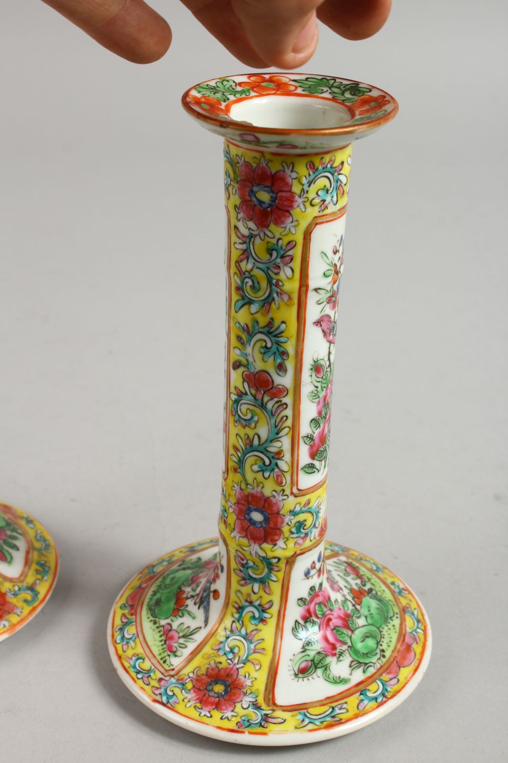 A GOOD PAIR OF CANTON FAMILLE JAUNE CANDLESTICKS with panels of flowers and birds. 7ins high. - Image 8 of 12