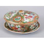 A 19TH CENTURY CHINESE CANTON FAMILLE ROSE PORCELAIN BOX, COVER & UNDERTRAY, the decoration of