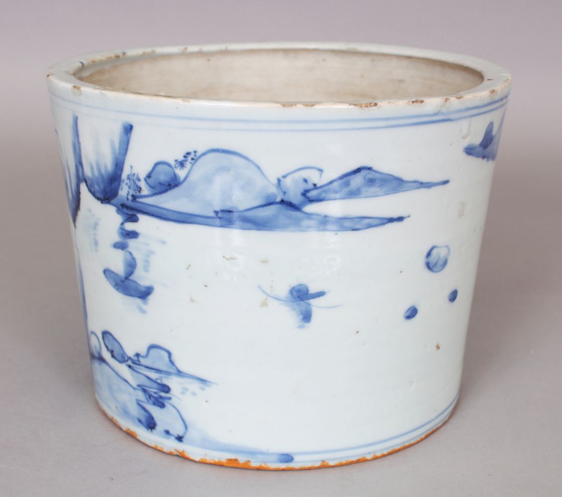 A CHINESE BLUE & WHITE PORCELAIN BRUSHPOT, the flaring sides painted with a continuous river - Image 3 of 7