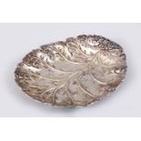 A TURKISH OTTOMAN SILVER LEAF SHAPED DISH, the dish bearing a tughra mark, 18cm x 14.5cm.