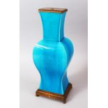 A GOOD CHINESE KANGXI PERIOD TURQUOISE PORCELAIN VASE / LAMP, the vase later mounted and fitted