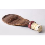 AN UNUSUAL POSSIBLY TURKISH OTTOMAN LEATHER POWDER FLASK, the carved bone handle with inlaid with