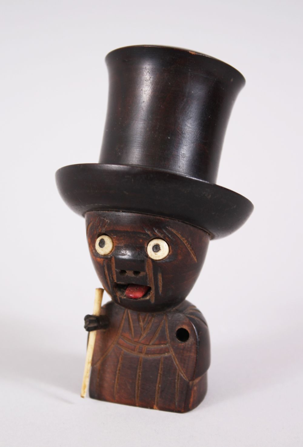 A JAPANESE KOBE TOY NOVELTY DICE SHAKER, as a gentleman wearing a top hat, pop out ivory eyes, his