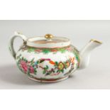 A CHINESE 19TH CENTURY CANTON TEAPOT AND COVER, 19cm wide including handle and spout.