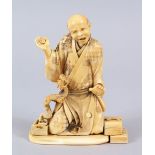 A JAPANESE MEIJI PERIOD CARVED IVORY OKIMONO OF AN ARHAT & DRAGON, the elder on his knees with his