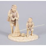 A JAPANESE MEIJI PERIOD CARVED IVORY OKIMONO OF FISHERMAN & BOY, the fisherman stood upon a carved