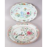 TWO 18TH / 19TH CENTURY CHINESE FAMILLE ROSE PORCELAIN MEAT PLATES, decorated with native flora