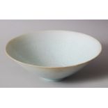 A GOOD CHINESE SONG STYLE CELADON PORCELAIN BOWL, the interior carved with foliage 20cm diameter x