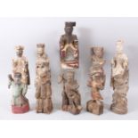 TEN 18TH / 19TH CENTURY CHINESE CARVED WOODEN FIGURES OF IMMORTALS, some with signs of lacquer,