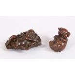 TWO SMALL CHINESE BRONZE FIGURES - PIG & BOY ON LOTUS LEAF, both with seal marks impressed, 6.