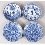 A GOOD SET OF FOUR KANGXI PERIOD CHINESE BLUE & WHITE PORCELAIN SAUCERS, two decorated with scenes