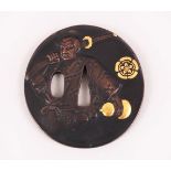 A JAPANESE MEIJI PERIOD BRONZE & MIXED METAL TSUBA OF A SAMURAI, the front of the tsuba with a