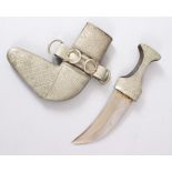 A GOOD PERSIAN JAMBYA DAGGER, the sheath with white metal and leather, 28.5cm long.