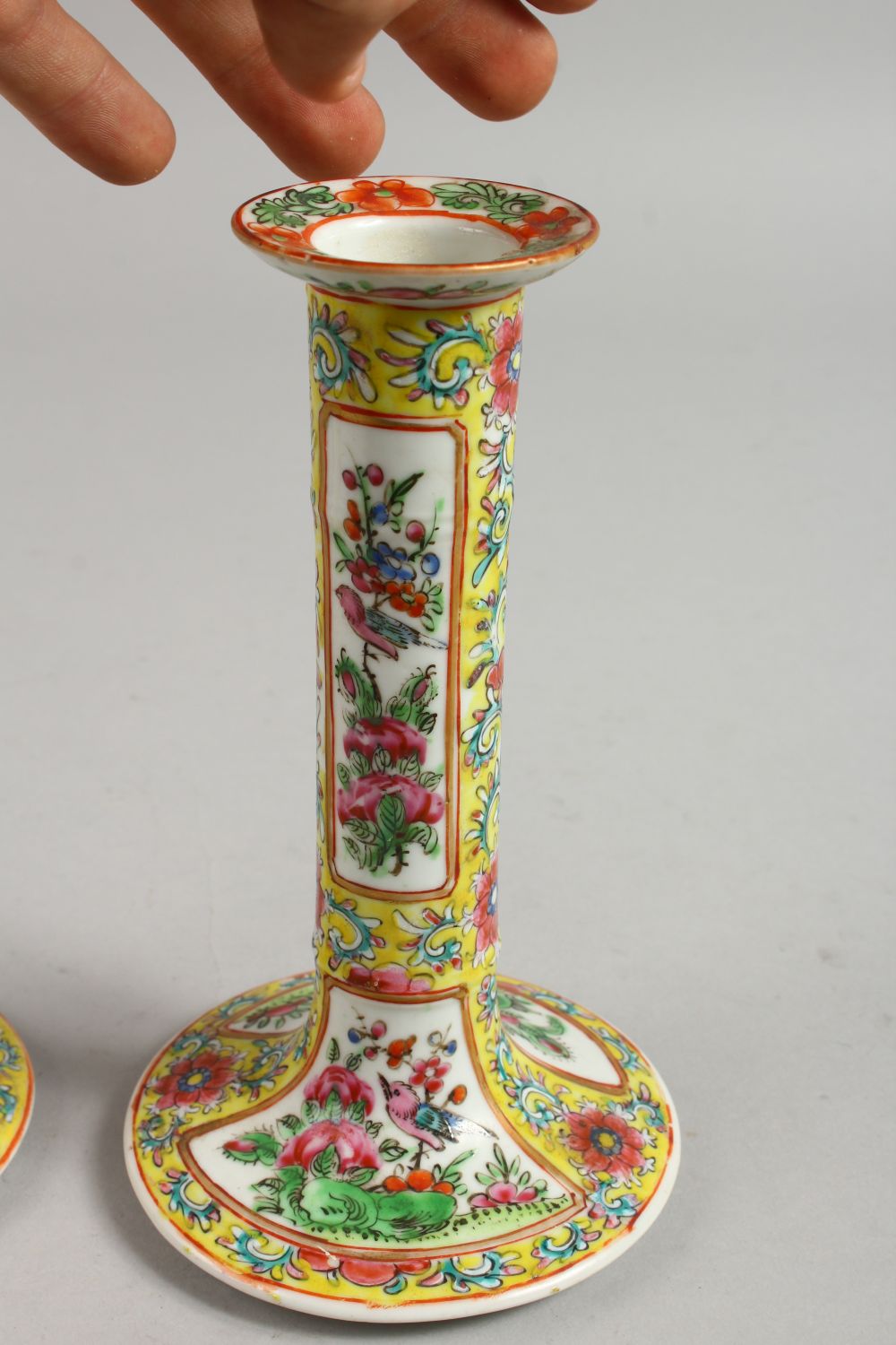 A GOOD PAIR OF CANTON FAMILLE JAUNE CANDLESTICKS with panels of flowers and birds. 7ins high. - Image 7 of 12