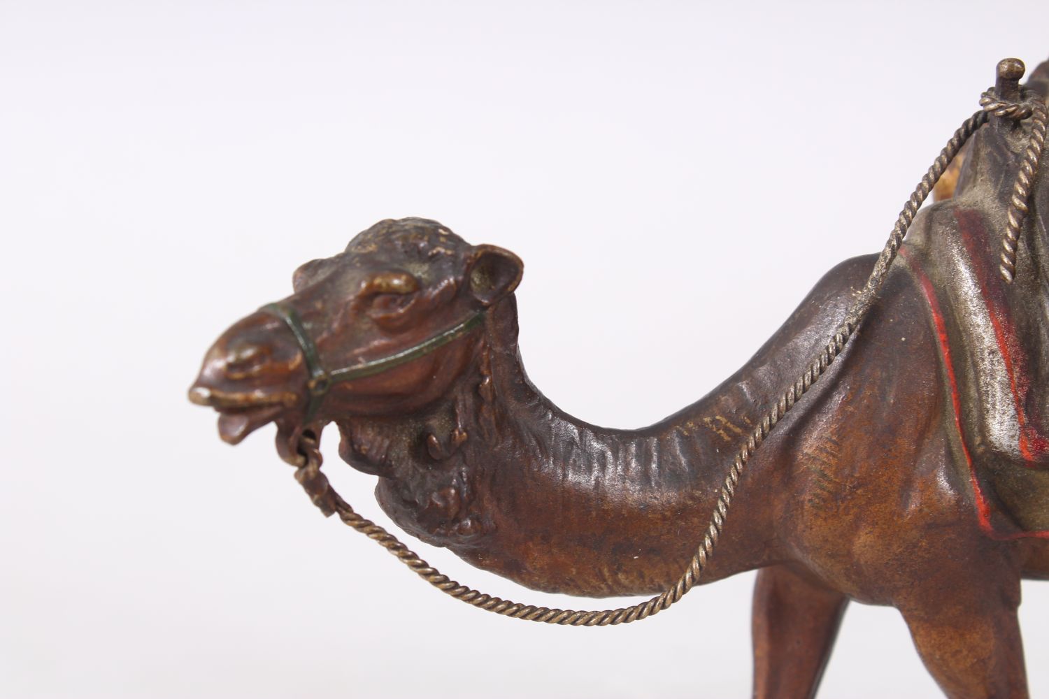 A FINE 19TH CENTURY COLD PAINTED BRONZE FIGURE OF AN ARAB UPON CAMEL BACK, the bronze most likely by - Image 2 of 7