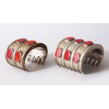 TWO GOOD 19TH / 20TH CENTURY CARNELIAN INSET SILVER & GILT TURKMEN BRACELETS, the bracelets each