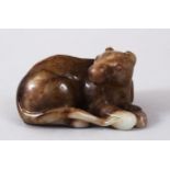 A GOOD 19TH / 20TH CENTURY CHINESE CARVED RUSSET JADE HORSE, in recumbent pose, 7.5cm wide x 4.5cm