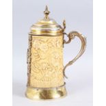 A LOVELY 19TH CENTURY GILT SILVER MOUNTED CHINESE STYLE CARVED IVORY TUSK SECTION TANKARD, The