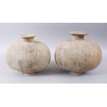 A PAIR OF UNUSUAL EARLY CHINESE BARREL SHAPED TERRACOTTA VESSEL, with broad circular neck and