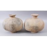 A PAIR OF UNUSUAL EARLY CHINESE BARREL SHAPED TERRACOTTA VESSEL, with broad circular neck and