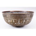 A LARGE 19TH CENTURY OR EARLIER SILVER INLAID BRASS MAMLUK REVIVAL BOWL, the body of the bowl with