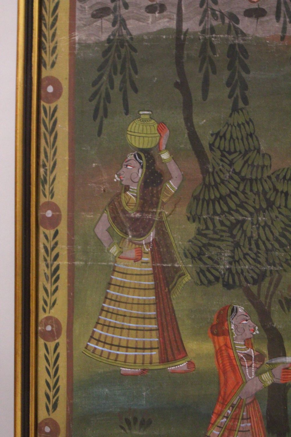 A 19TH-20TH CENTURY FRAMED INDIAN PAINTING ON TEXTILE depicting a prince presenting orange paint - Image 3 of 3