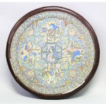 A VERY GOOD 19TH CENTURY PERSIAN QAJAR CIRCULAR TILE / TABLE, the tile depicting various scenes of