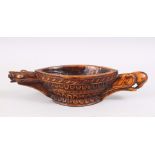AN UNUSUAL 17TH / 18TH CENTURY INDIAN KHARAL CARVED WOODEN OPIUM BOWL, the bowl unusually carved
