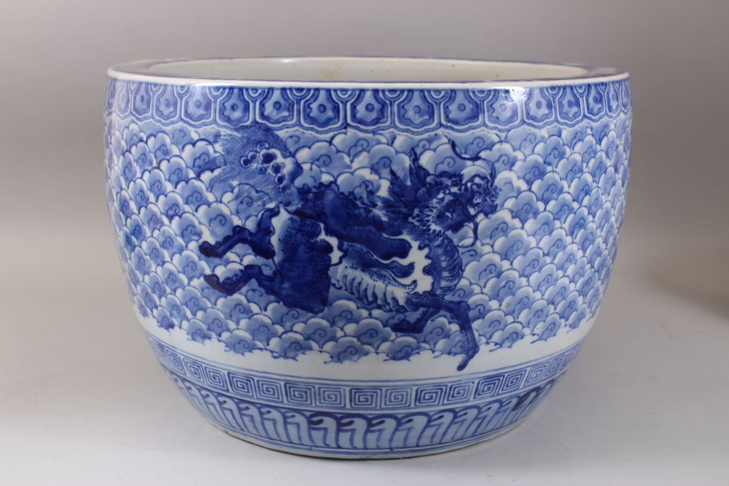 A GOOD JAPANESE MEIJI PERIOD BLUE & WHITE ARITA PORCELAIN JARDINIERE, decorated with scenes of - Image 2 of 6