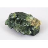 A GOOD 19TH / 20TH CENTURY CHINESE CARVED JADE BELT DECORATION OF A KYLIN, 6CM X 4.5CM