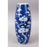 A GOOD 19TH CENTURY CHINESE BLUE & WHITE PORCELAIN PRUNUS VASE, the base with a four-character