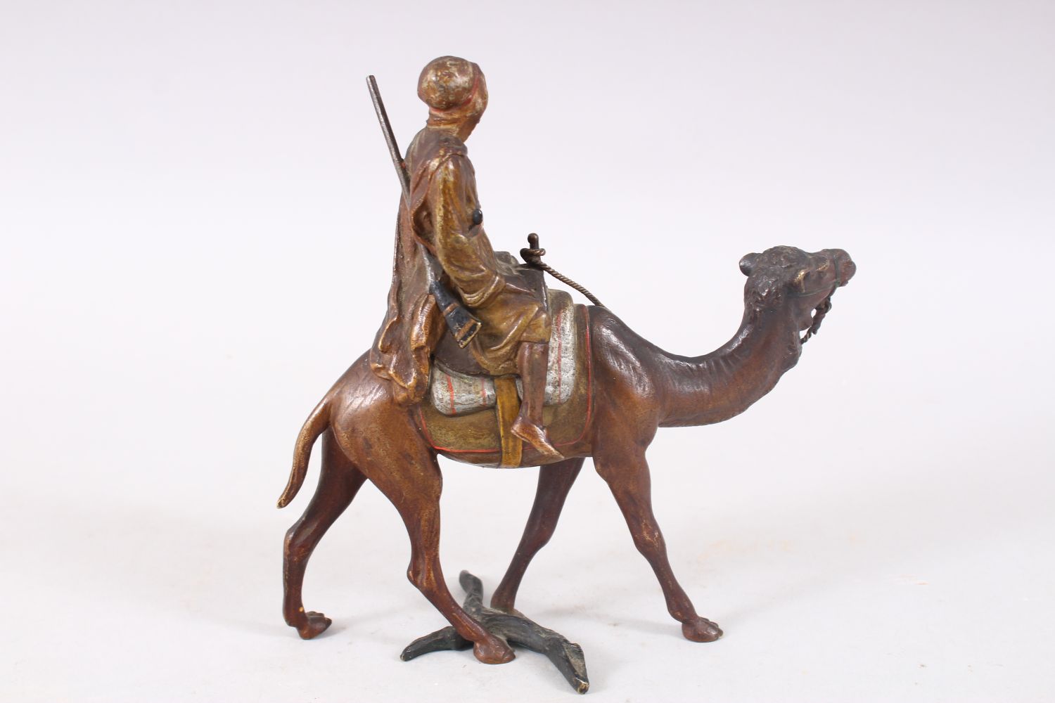 A FINE 19TH CENTURY COLD PAINTED BRONZE FIGURE OF AN ARAB UPON CAMEL BACK, the bronze most likely by - Image 4 of 7