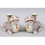 A GOOD PAIR OF 19TH / EARLY 20TH CENTURY CHINESE FAMILLE ROSE LION DOG JOSS STICK HOLDERS,