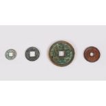 A COLLECTION OF FOUR ANCIENT CHINESE COINS, one Xin dynasty, one Wu Chu, one southern Song dynasty