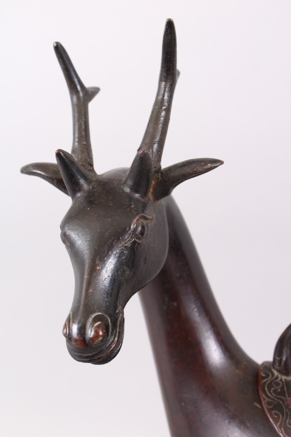 A 19TH CENTURY CHINESE BRONZE CENSER / BURNER OF A DEER, the deer in a gentle pose with one hoof - Image 4 of 7