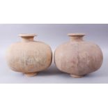 A PAIR OF UNUSUAL EARLY CHINESE BARREL SHAPED TERRACOTTA VESSEL, with broad circular neck and