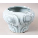 A GOOD CHINESE ROBINS EGG GROUND RIBBED PORCELAIN JARDINERE, the body ribbed, the base unglazed,