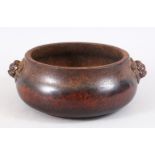 A HEAVY QUALITY CHINESE BRONZE CENSER, with moulded lion dog mask handles and a maker’s mark pressed