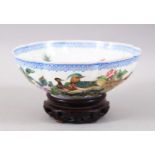 A GOOD CHINESE 20TH CENTURY EGGSHELL PORCELAIN BOWL, decorated with scenes of lotus flowers and blue