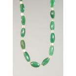 A GOOD CHINESE JADE / JADELIKE HARDSTONE & PEARL ELONGATED NECKLACE, 72cm open.