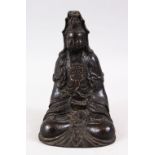 A GOOD 18TH / 19TH CENTURY CHINESE BRONZE FIGURE OF GUANYIN, in a seated meditating pose, the base