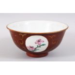 A CHINESE REPUBLIC STYLE BROWN GROUND FAMILLE ROSE PORCELAIN BOWL, with roundel panels of floral